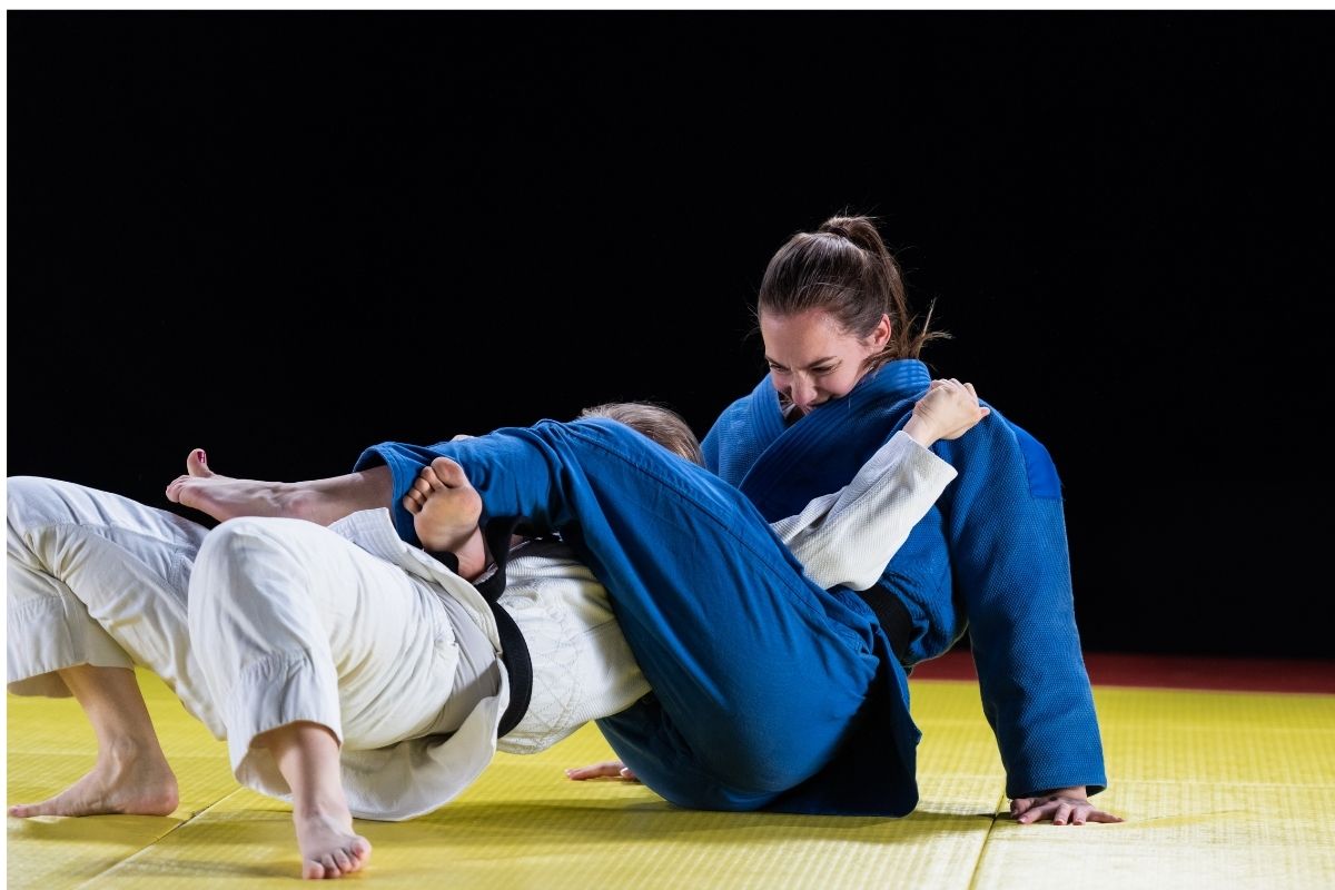 Female Judoka Choking with Legs
