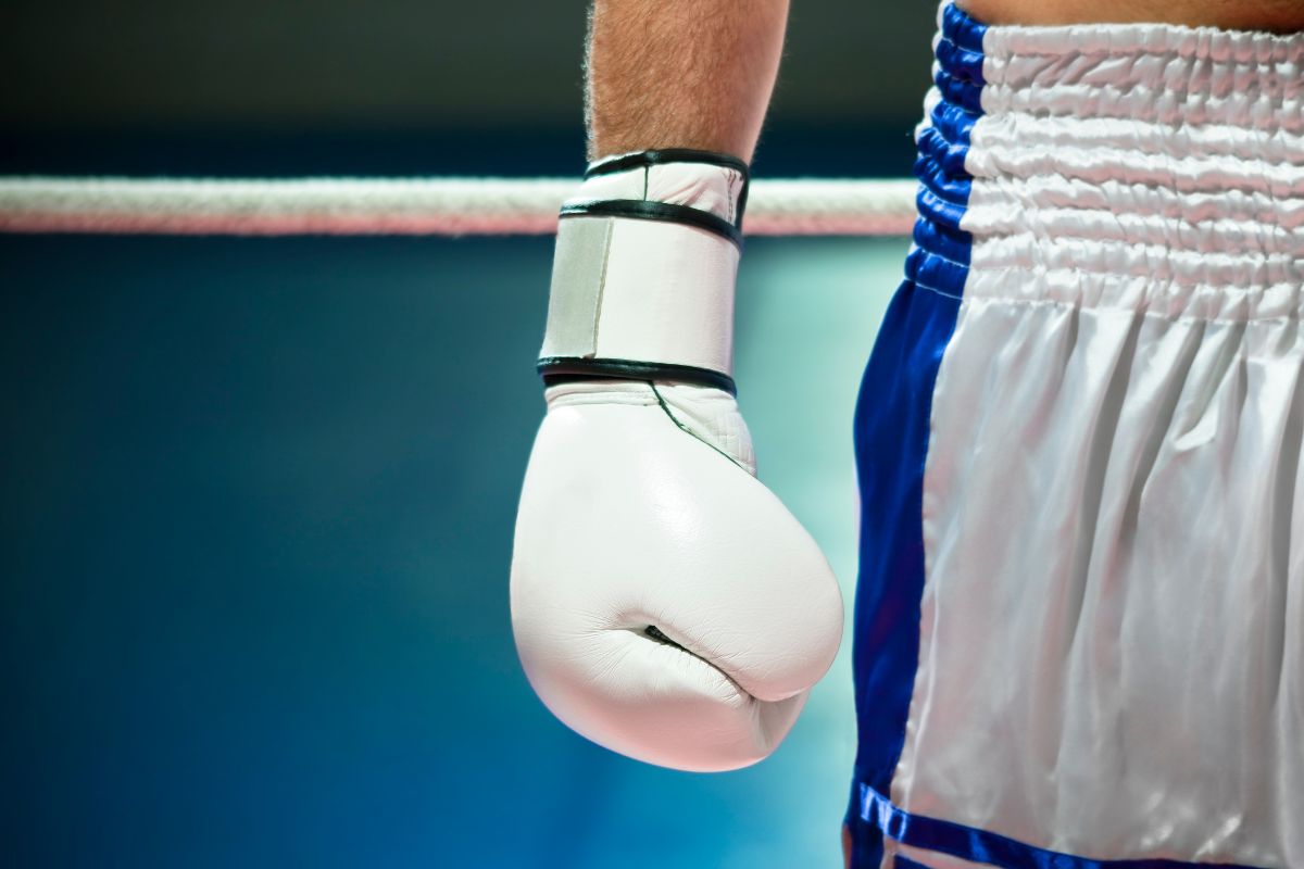 Man with white boxing gloves