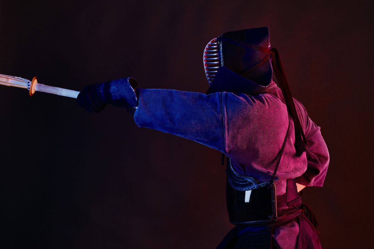 Kendo fighter in dark room